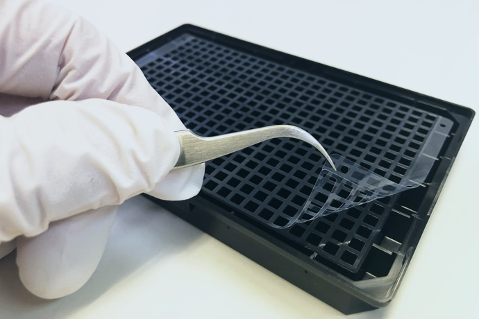 Lamination Without Adhesive Burrs or Attaching Dust to Edge