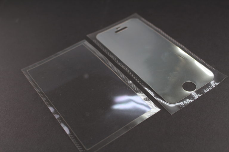 Precision die-cutting and lamination of screen protective films