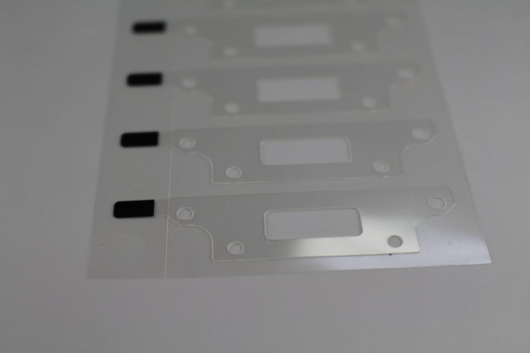 Tape bonding to an aluminum heat sink inside a monitor